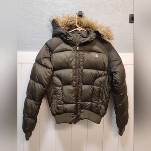The North Face army green puffer jacket.
